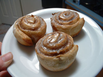a picture of three cinnamon rolls made from pizza dough...