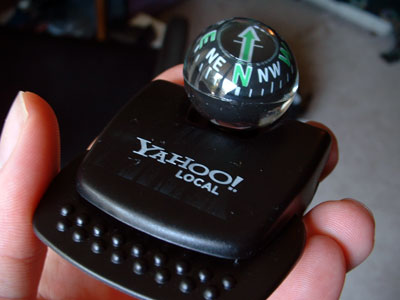 an image of a dashboard-mountable compass given away by the yahoo local team at Where 2.0